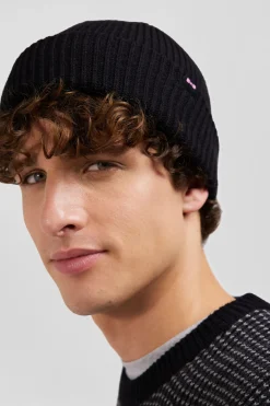 Black knitted beanie with bow tie embroidery