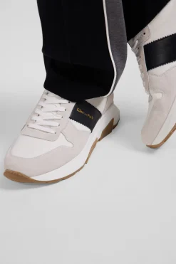 Chunky sole beige and navy blue leather sneakers