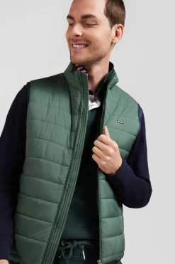 Green quilted sleeveless high collar down vest