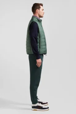 Green quilted sleeveless high collar down vest