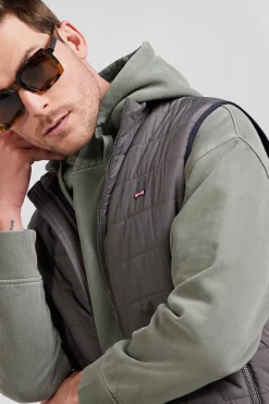 Grey quilted sleeveless high collar down vest