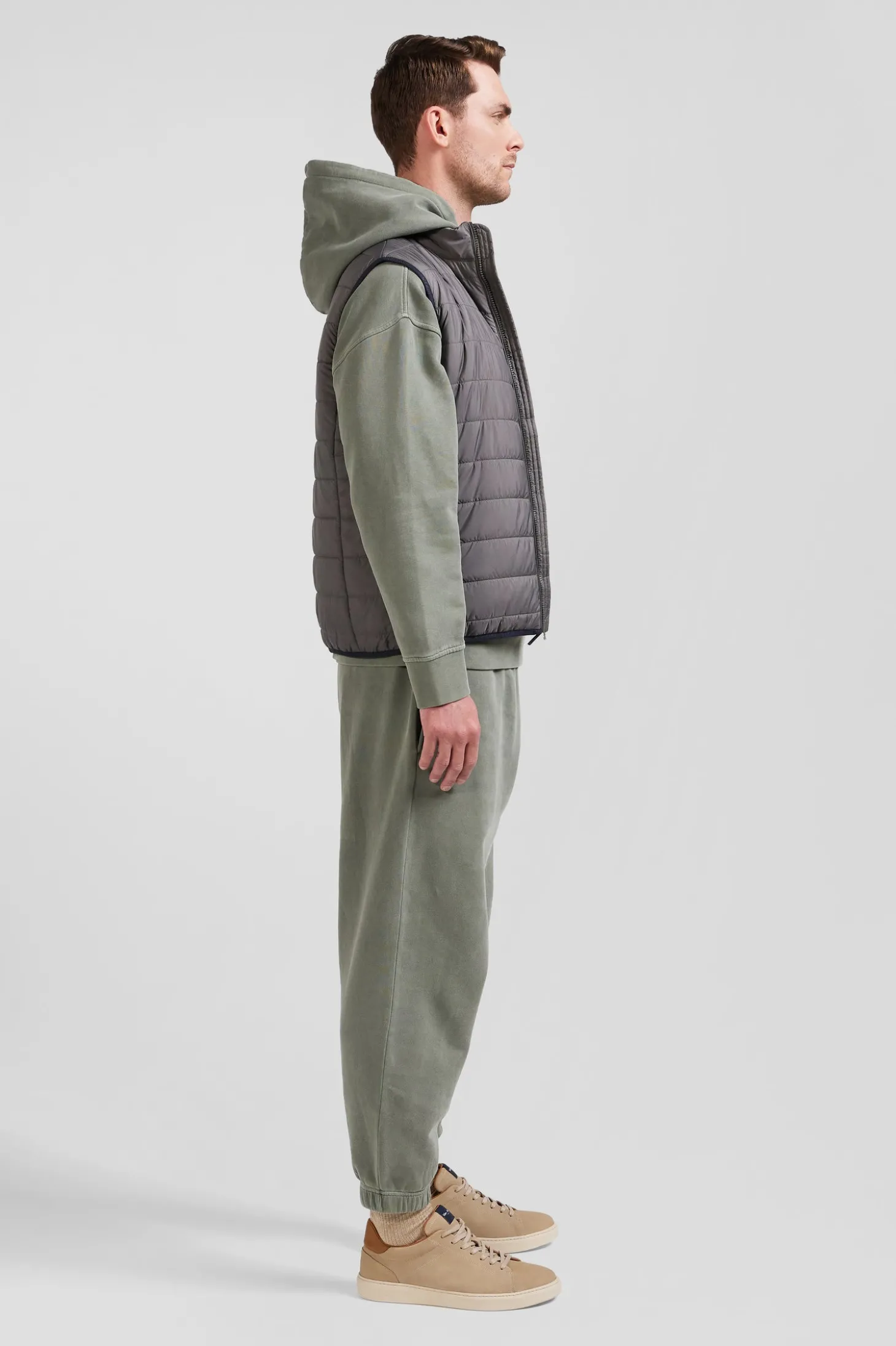 Grey quilted sleeveless high collar down vest