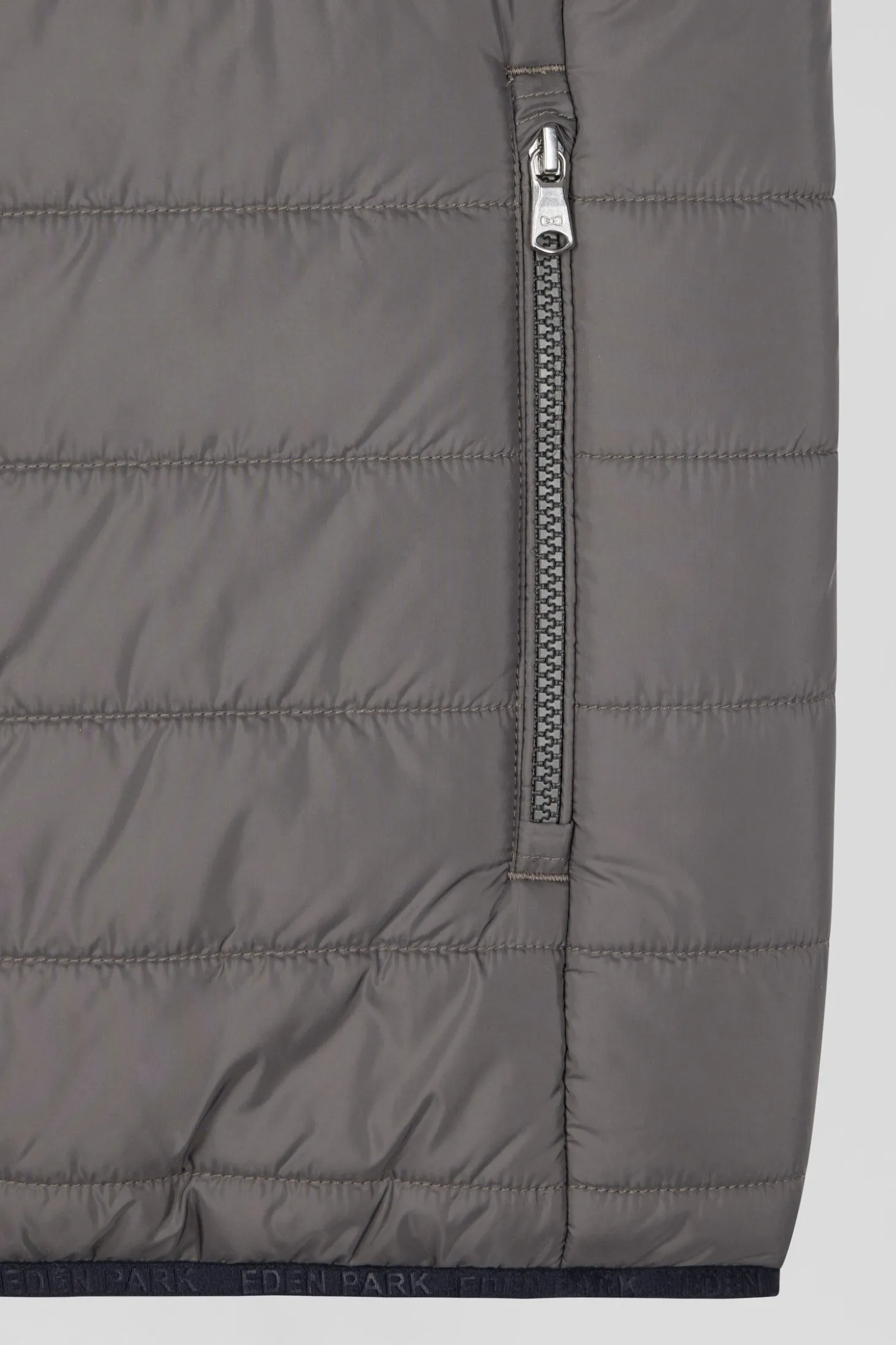 Grey quilted sleeveless high collar down vest