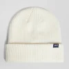 Ivory knitted beanie with bow tie embroidery