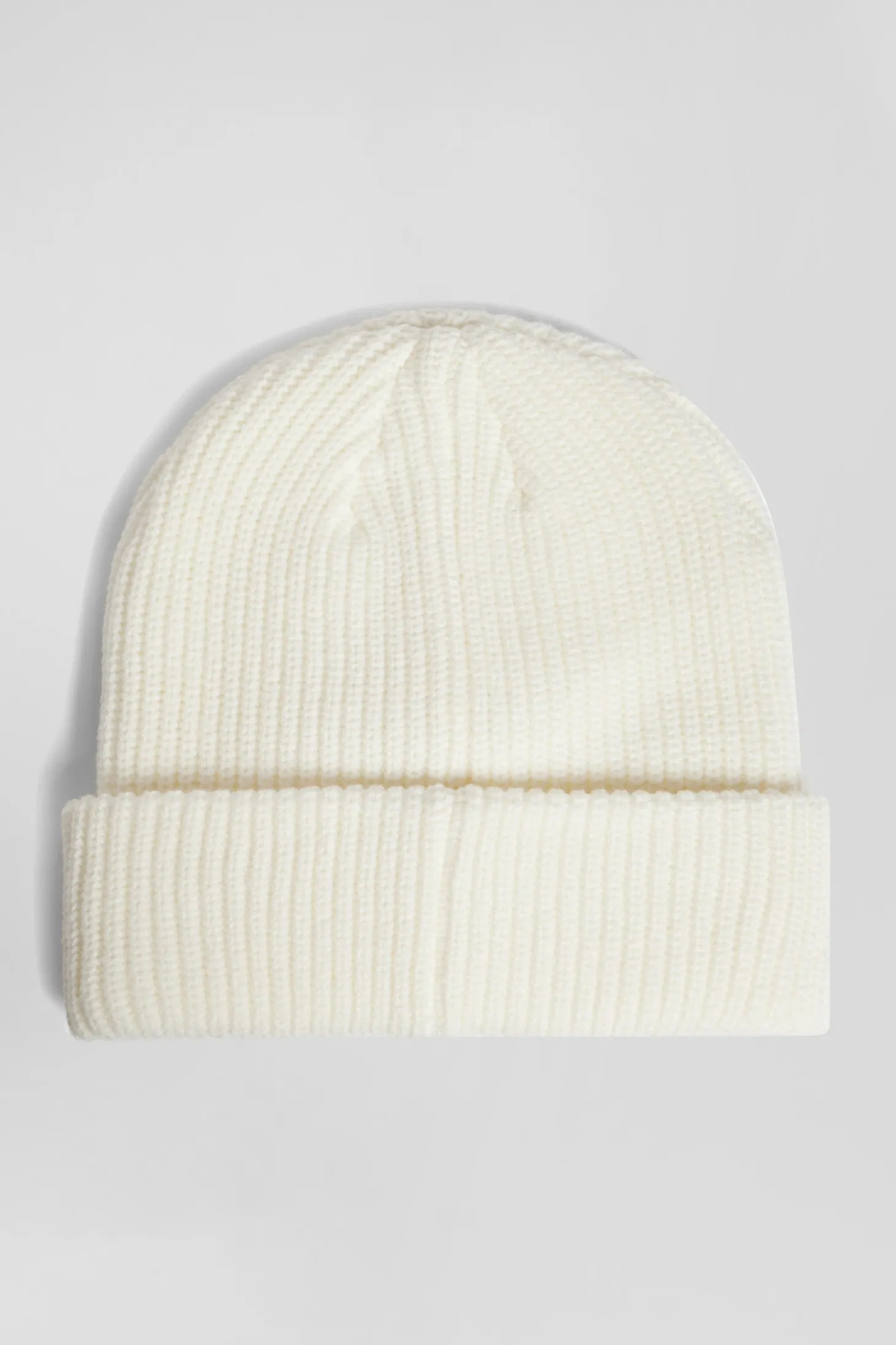 Ivory knitted beanie with bow tie embroidery