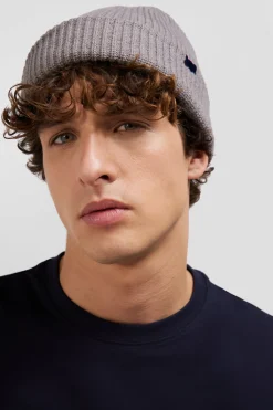 Mottled grey knitted beanie with bow tie embroidery