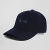 Navy blue cap with bow tie emblem