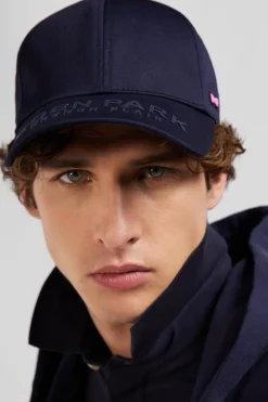 Navy blue cotton cap with branded visor