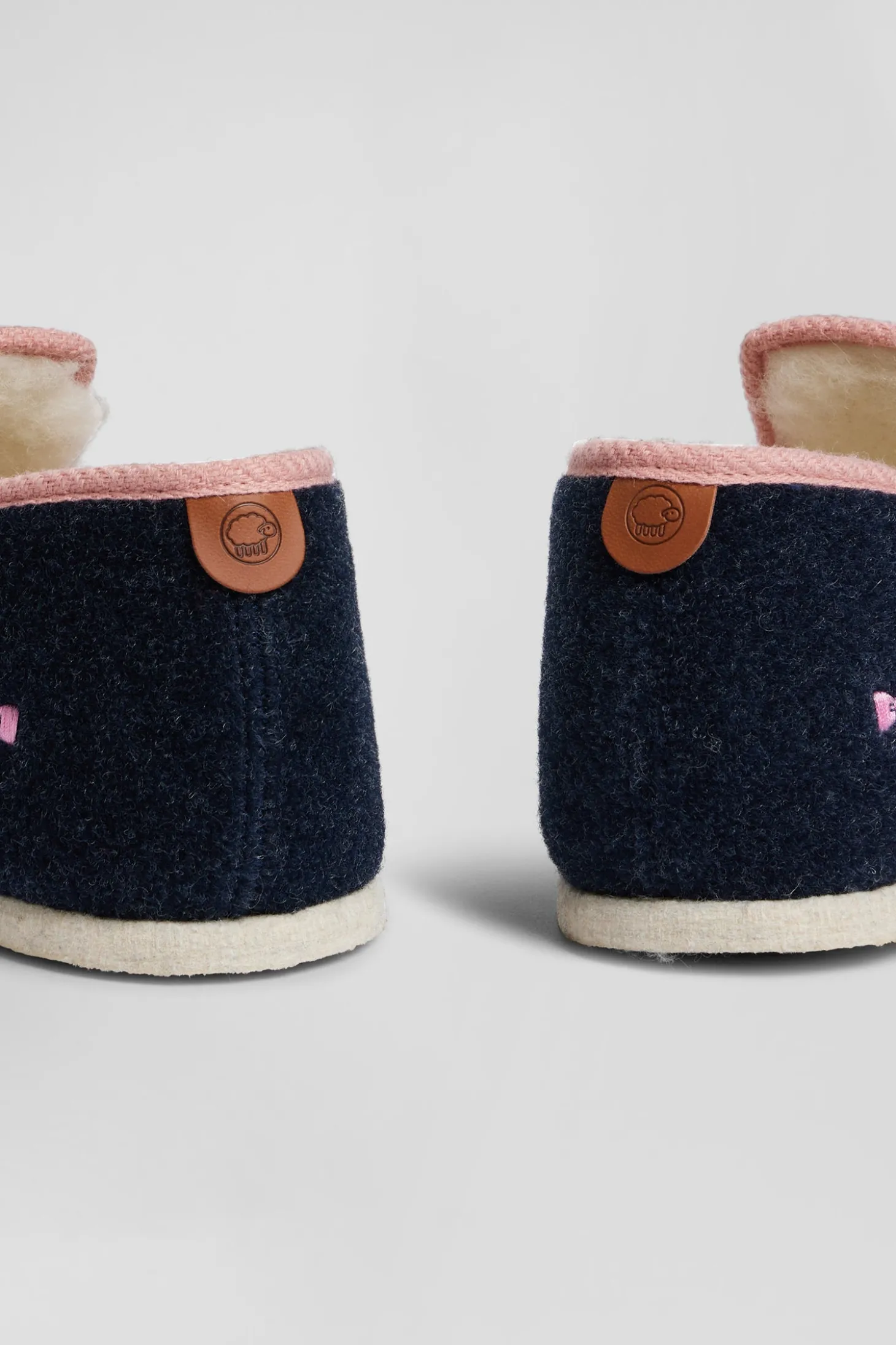 Navy blue felt and shearling slippers