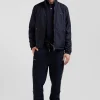 Navy blue matte nylon windbreaker with striped back embroidery