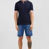 Navy blue pima cotton polo with contrasting accents