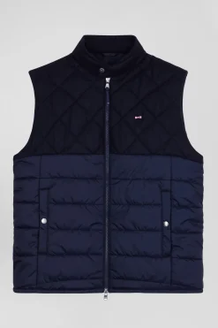 Navy blue sleeveless double quilted high collar down vest