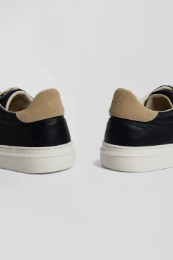 Navy low-top leather sneakers