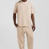 Oversize beige unisex short-sleeved T-shirt in overdyed cotton