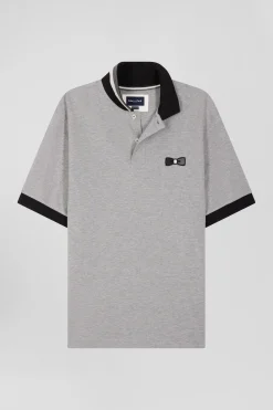 Oversize black short-sleeved cotton piqué polo shirt with tricolor details
