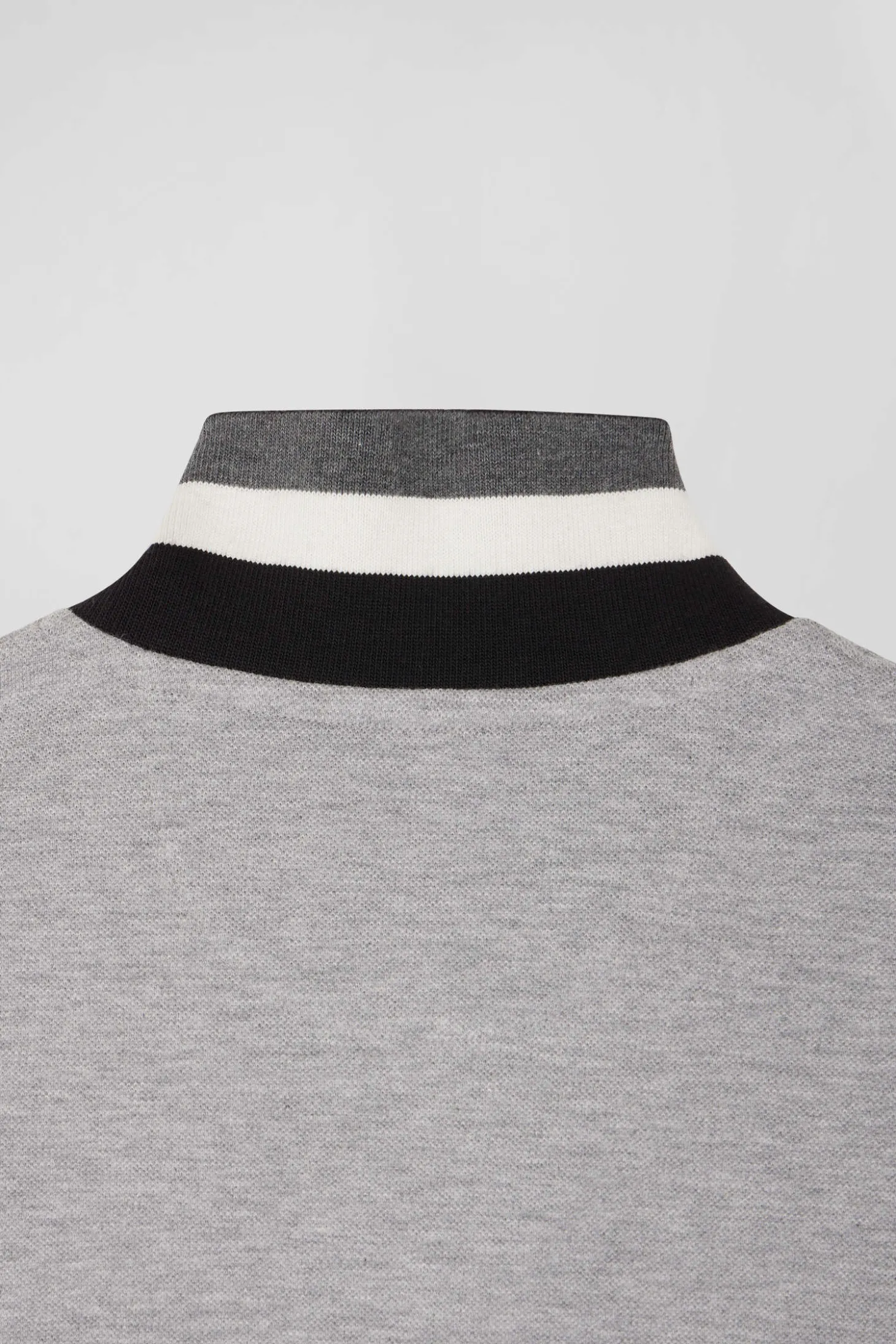 Oversize black short-sleeved cotton piqué polo shirt with tricolor details