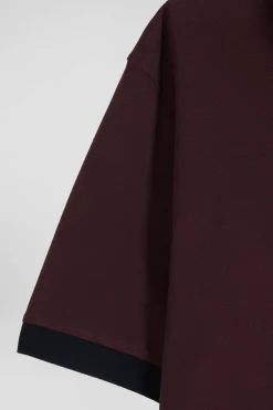 Oversize burgundy short-sleeved cotton piqué polo shirt with tricolor details