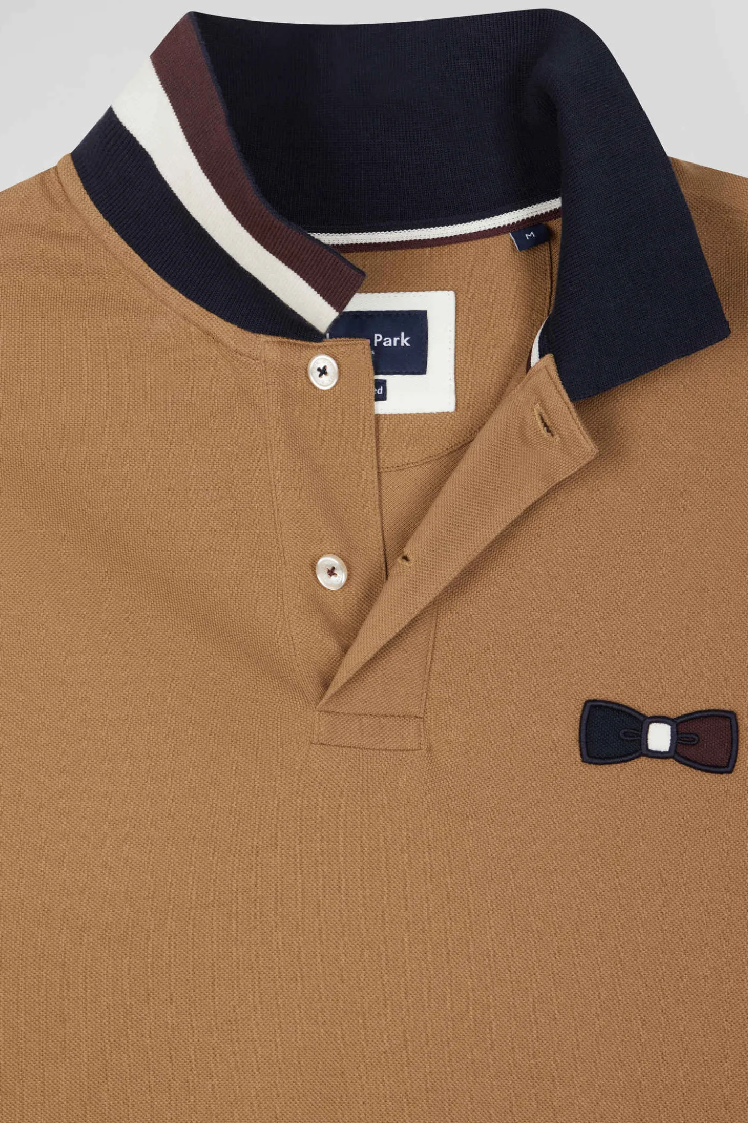 Oversize navy blue short-sleeved cotton piqué polo shirt with tricolor details
