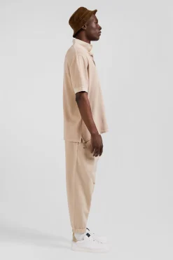 Oversized beige unisex short-sleeved cotton piqué polo shirt