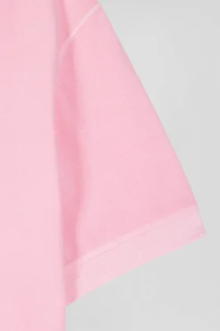 Oversized pink unisex short-sleeved cotton piqué polo shirt