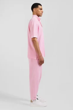Oversized pink unisex short-sleeved cotton piqué polo shirt