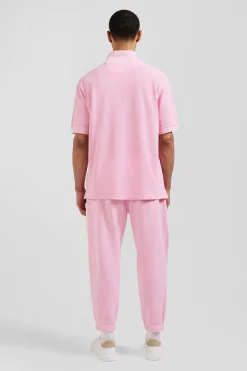 Oversized pink unisex short-sleeved cotton piqué polo shirt