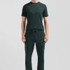 Regular green short-sleeved cotton T-shirt with tie patchwork emblem