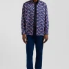 Regular navy blue cotton twill shirt with pink floral print