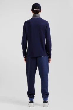 Regular navy blue long-sleeved cotton piqué polo shirt with rubber badge