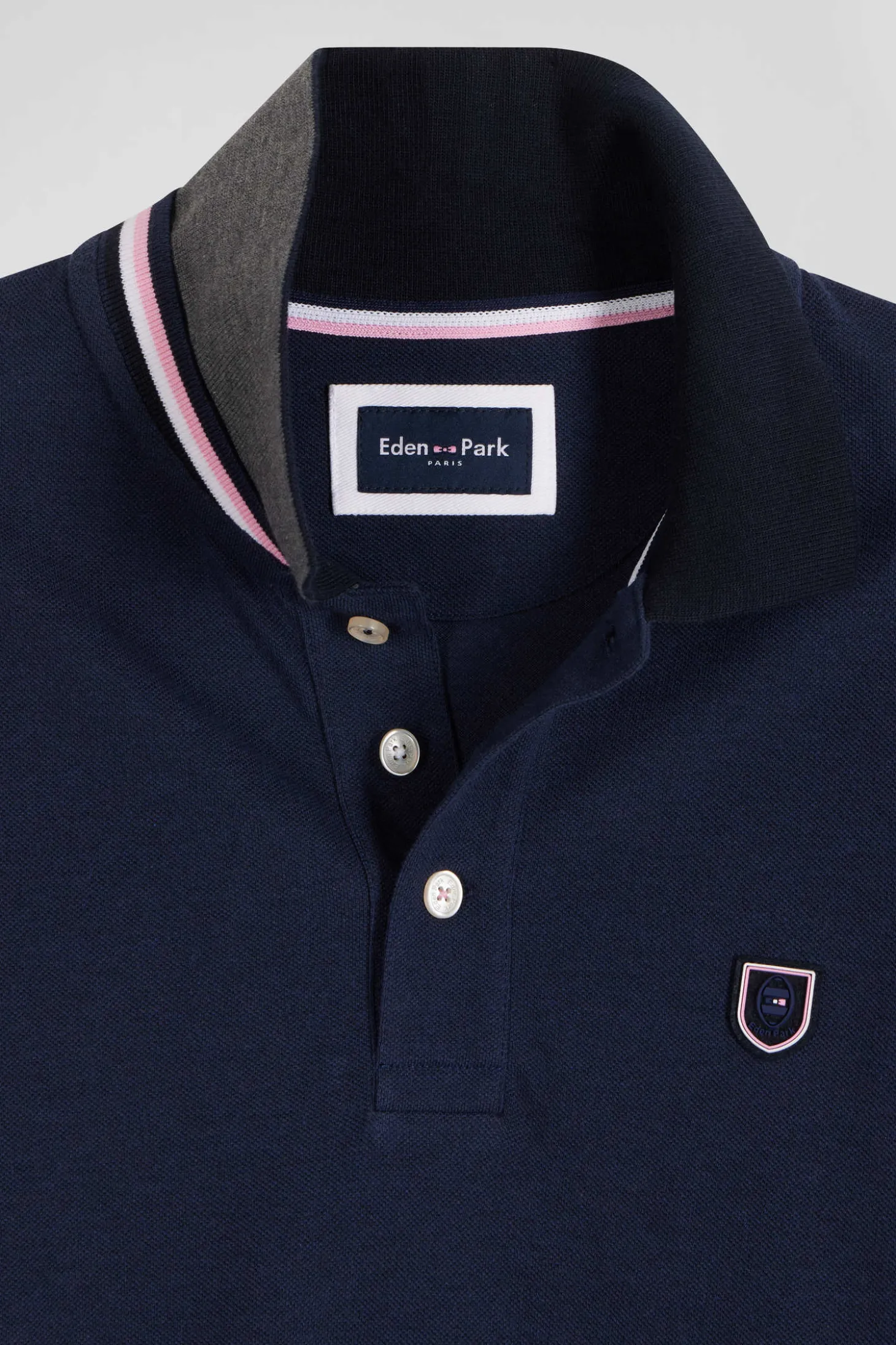 Regular navy blue long-sleeved cotton piqué polo shirt with rubber badge