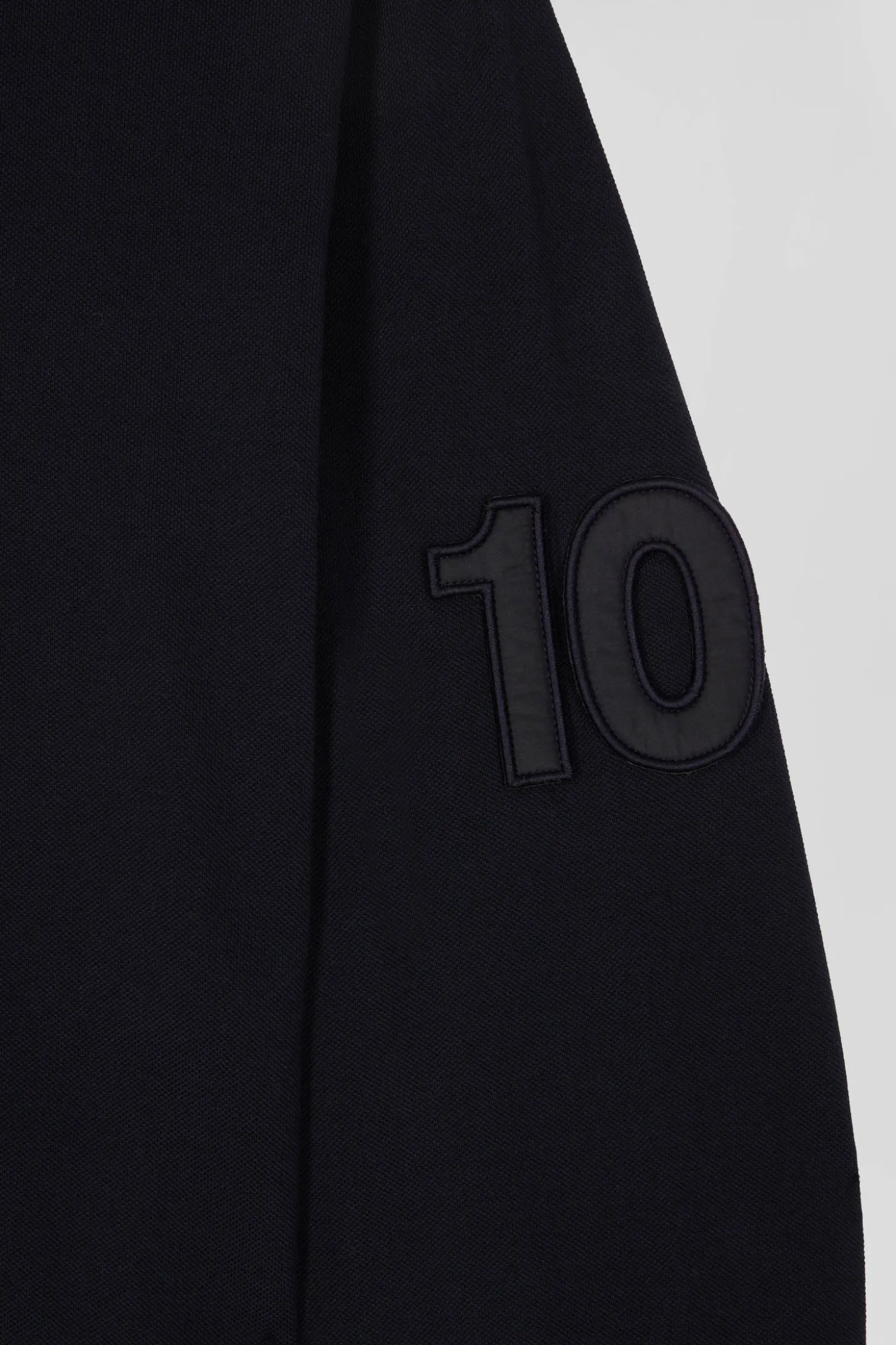 Regular navy blue long-sleeved cotton piqué polo shirt with padded embroidery