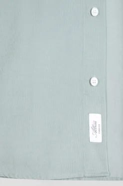 Regular plain aqua green cotton shirt with button-down collar and chest pocket