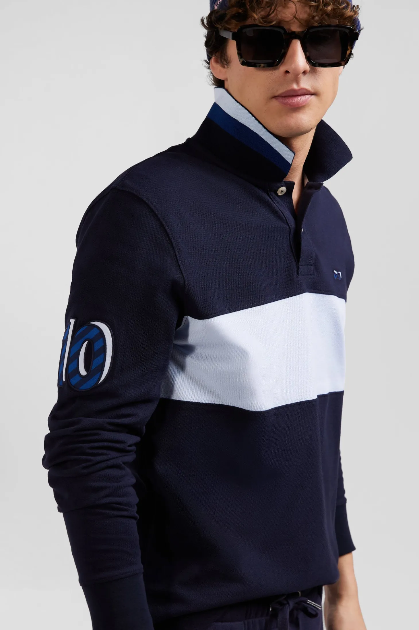 Regular sky blue long-sleeved cotton piqué polo shirt with sleeve embroidery