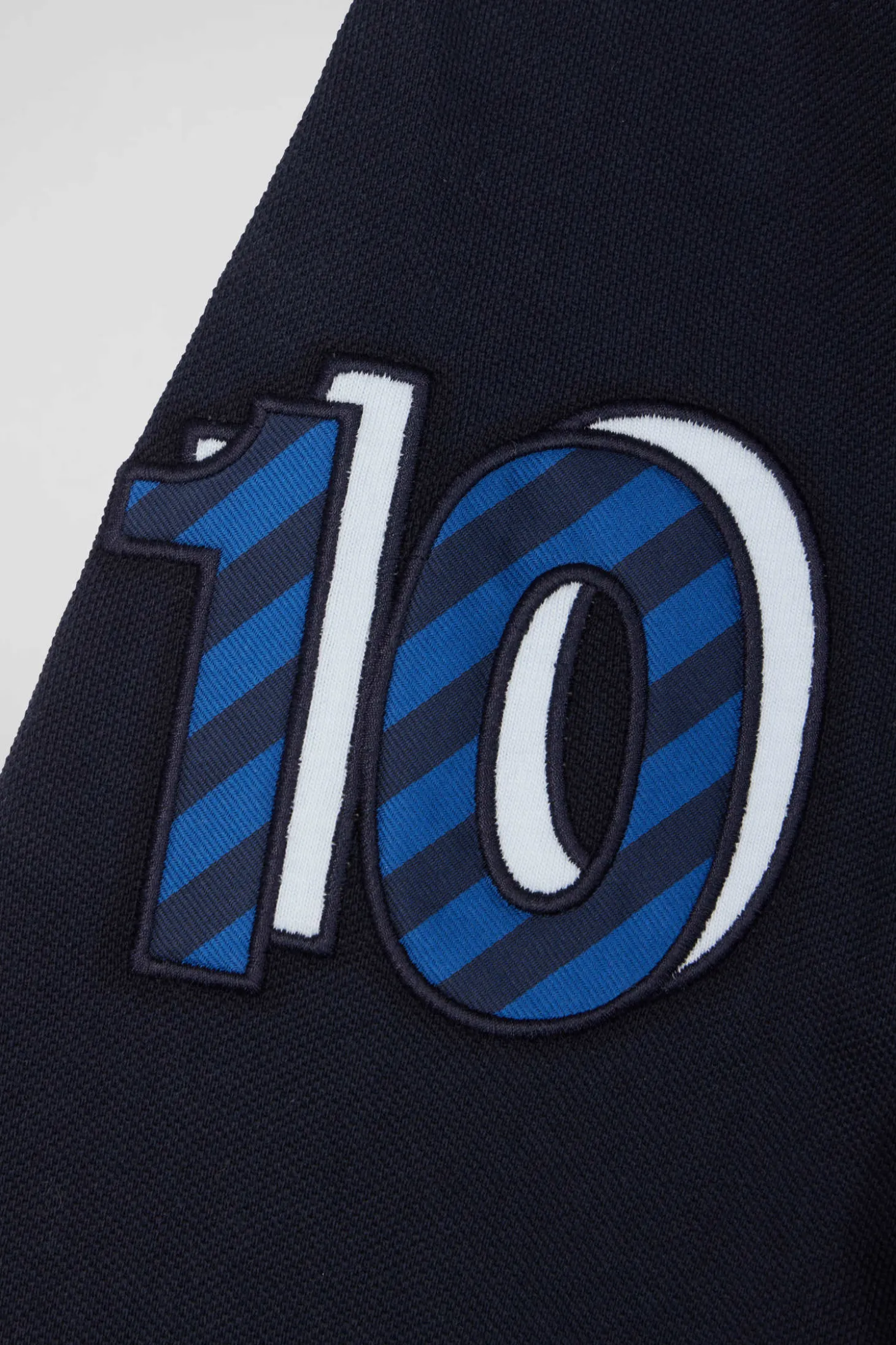 Regular sky blue long-sleeved cotton piqué polo shirt with sleeve embroidery