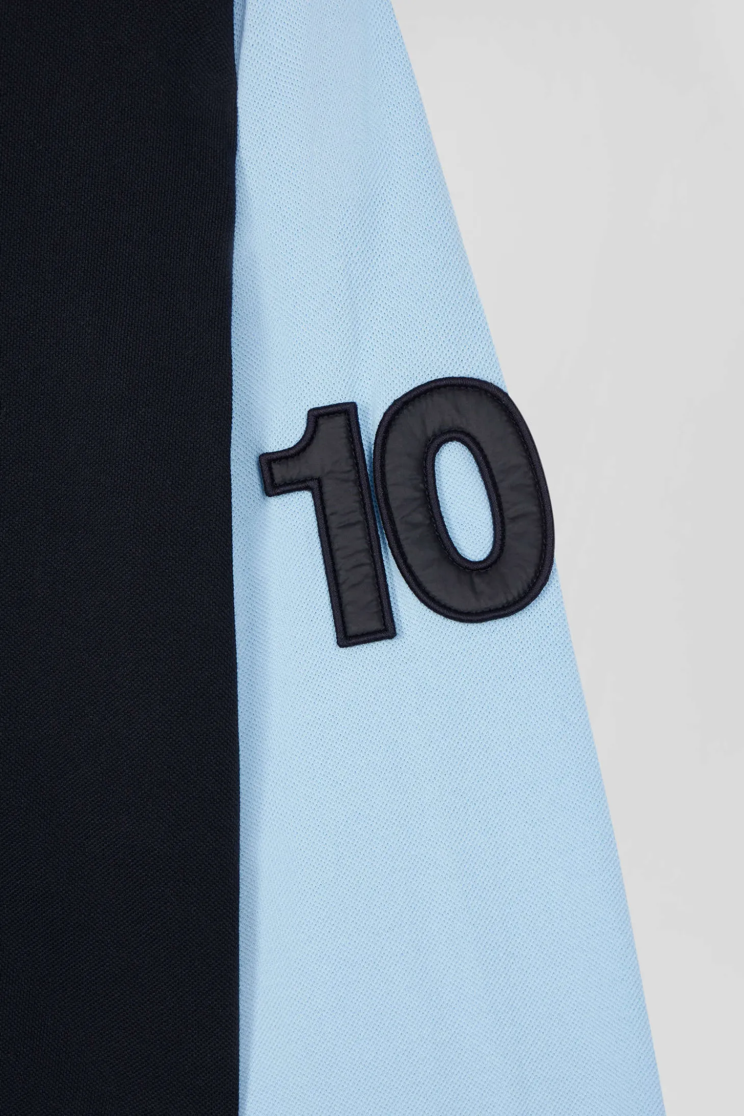 Regular sky blue long-sleeved cotton piqué polo shirt with padded embroidery