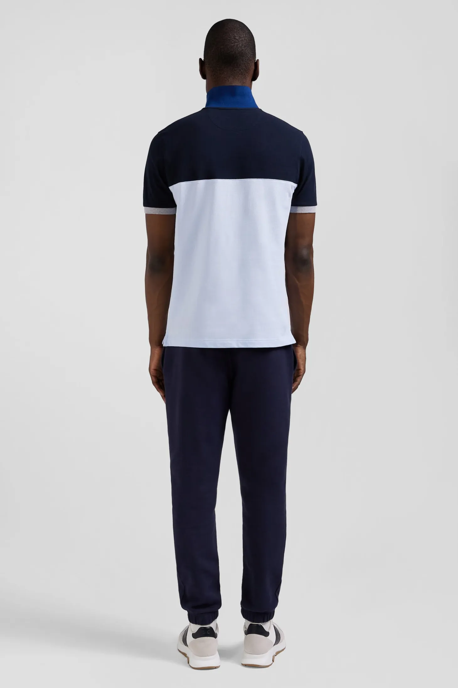 Regular sky blue short-sleeved cotton piqué polo shirt with bow tie embroidery and contrasting details
