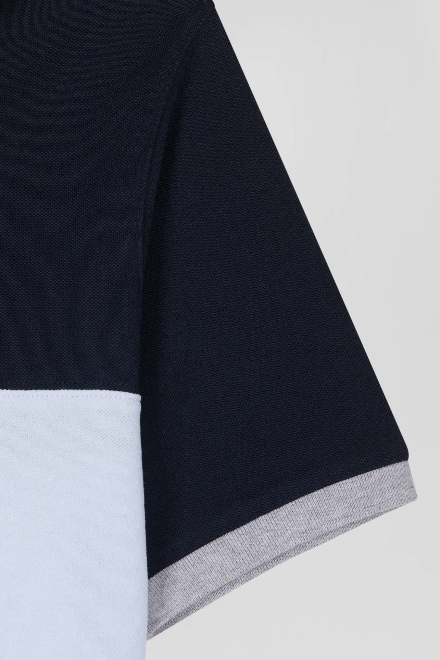 Regular sky blue short-sleeved cotton piqué polo shirt with bow tie embroidery and contrasting details