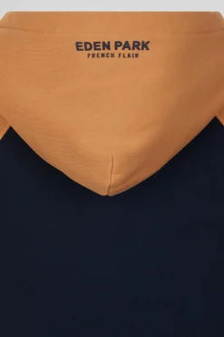 Relaxed navy blue and camel fleece hoodie with branded drawstrings
