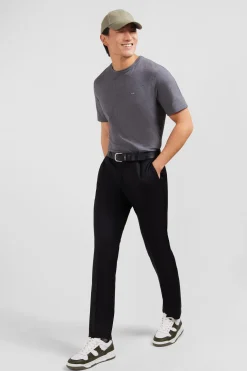 Slim black wool trousers with broken fold