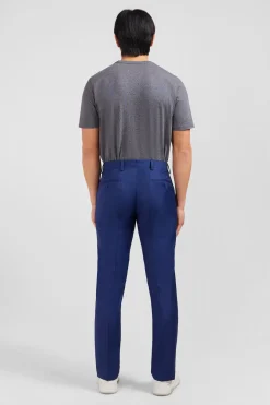 Slim blue wool trousers with broken fold