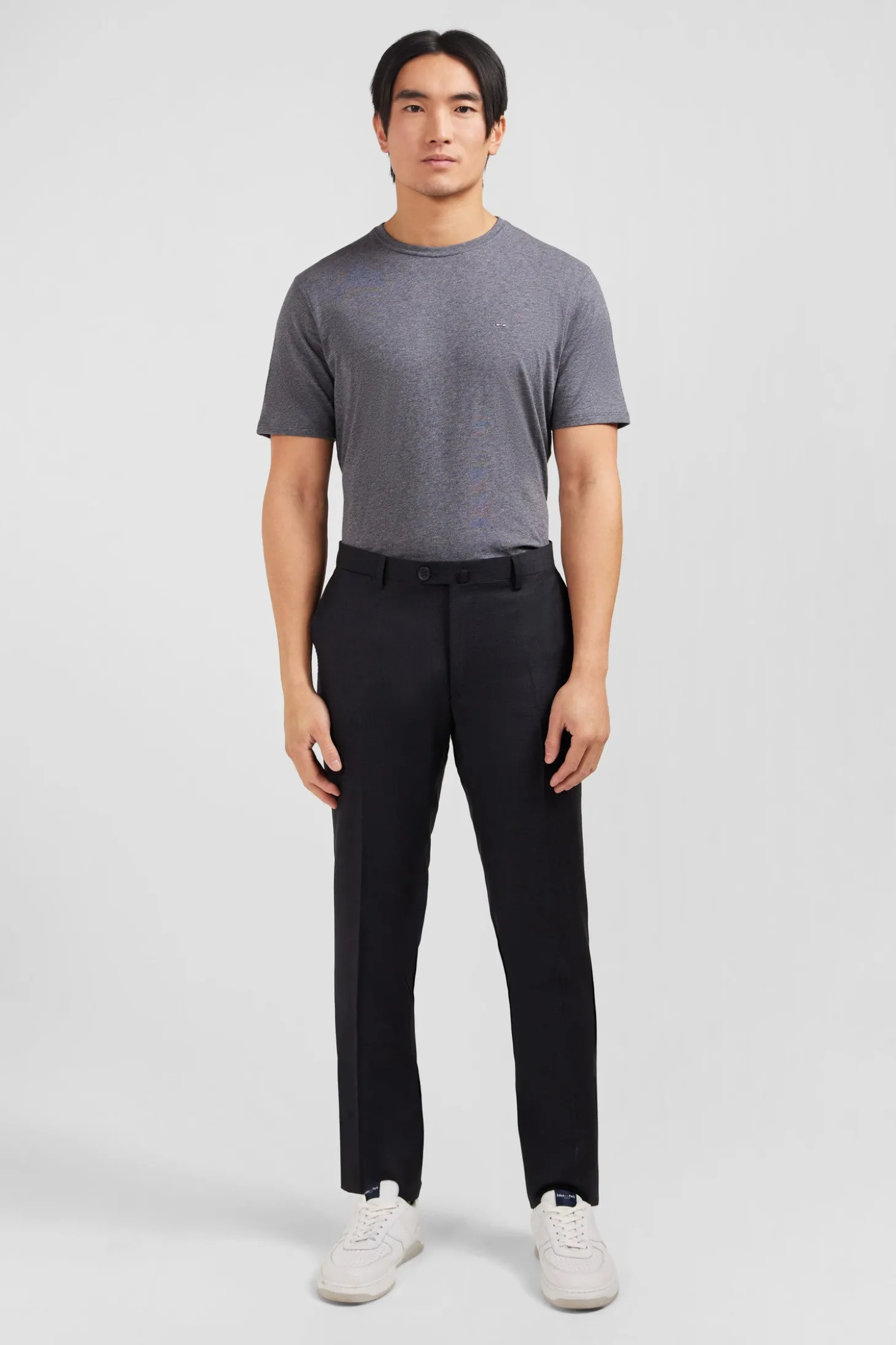 Slim dark grey wool trousers with broken fold