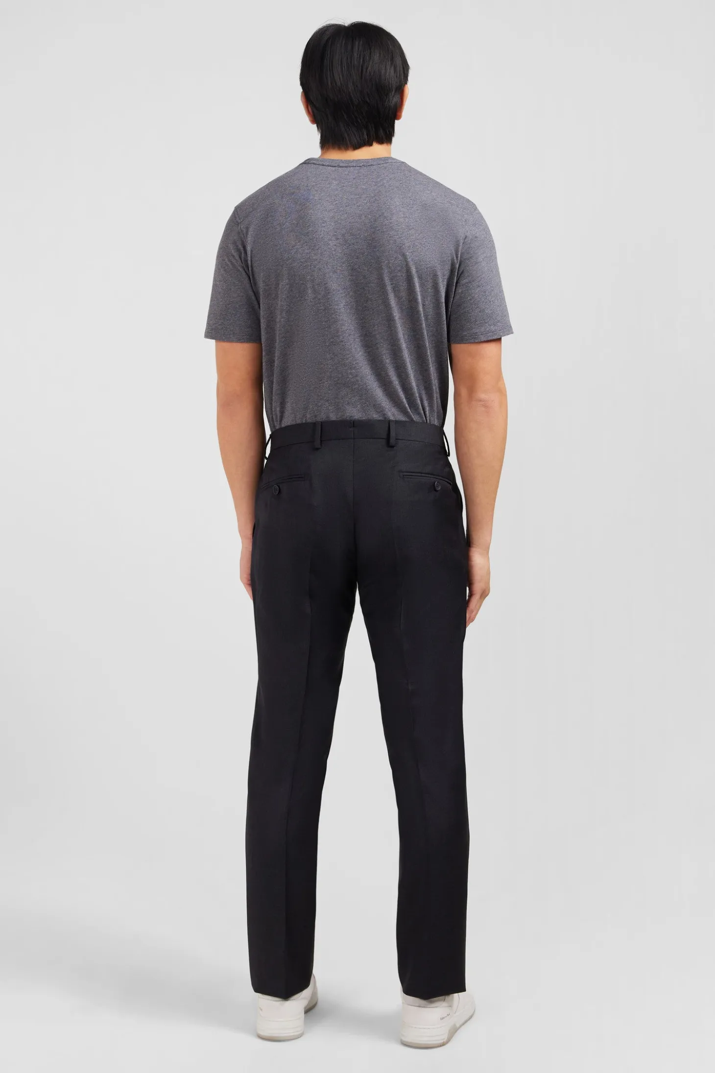 Slim dark grey wool trousers with broken fold