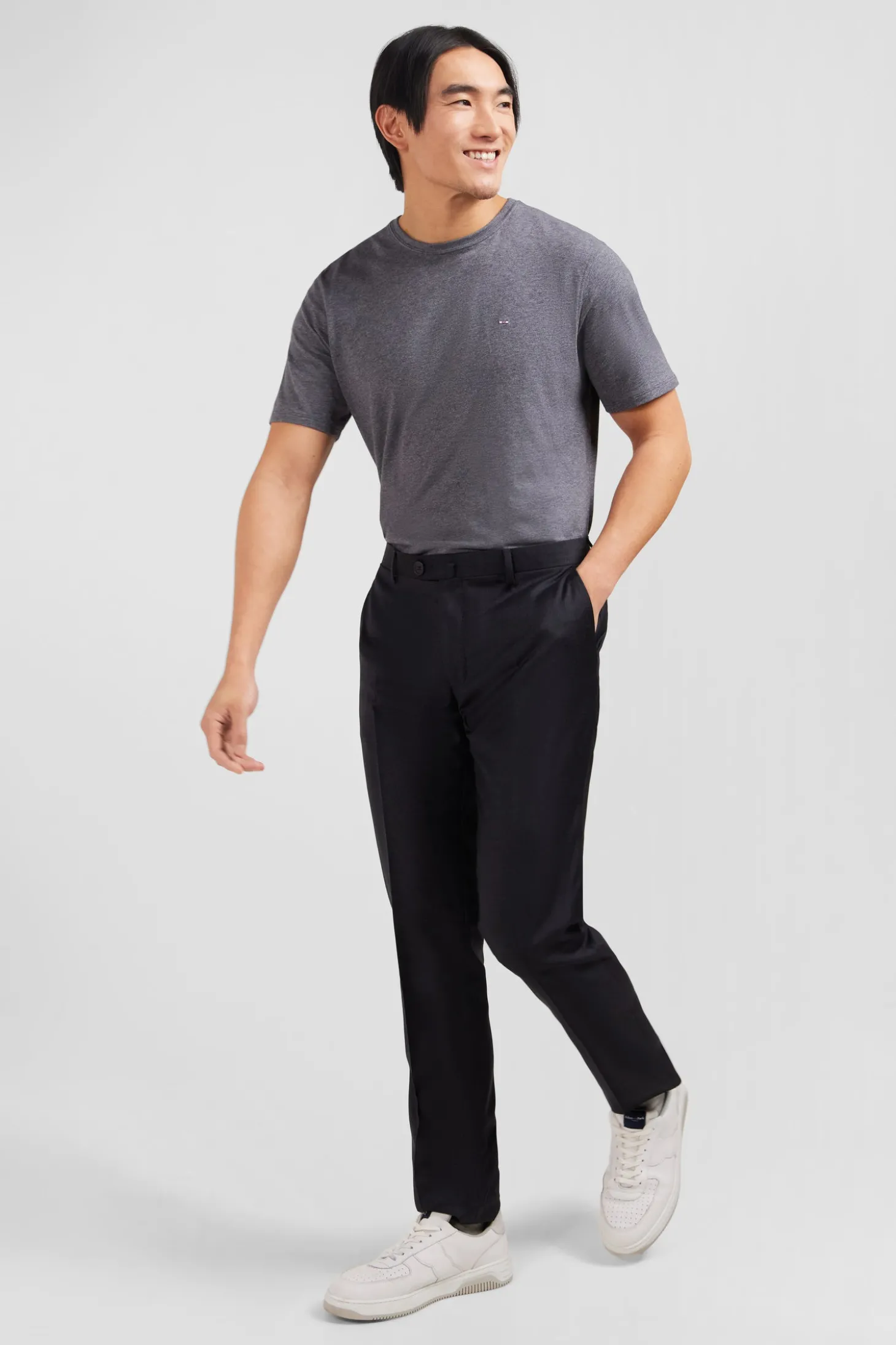 Slim dark grey wool trousers with broken fold