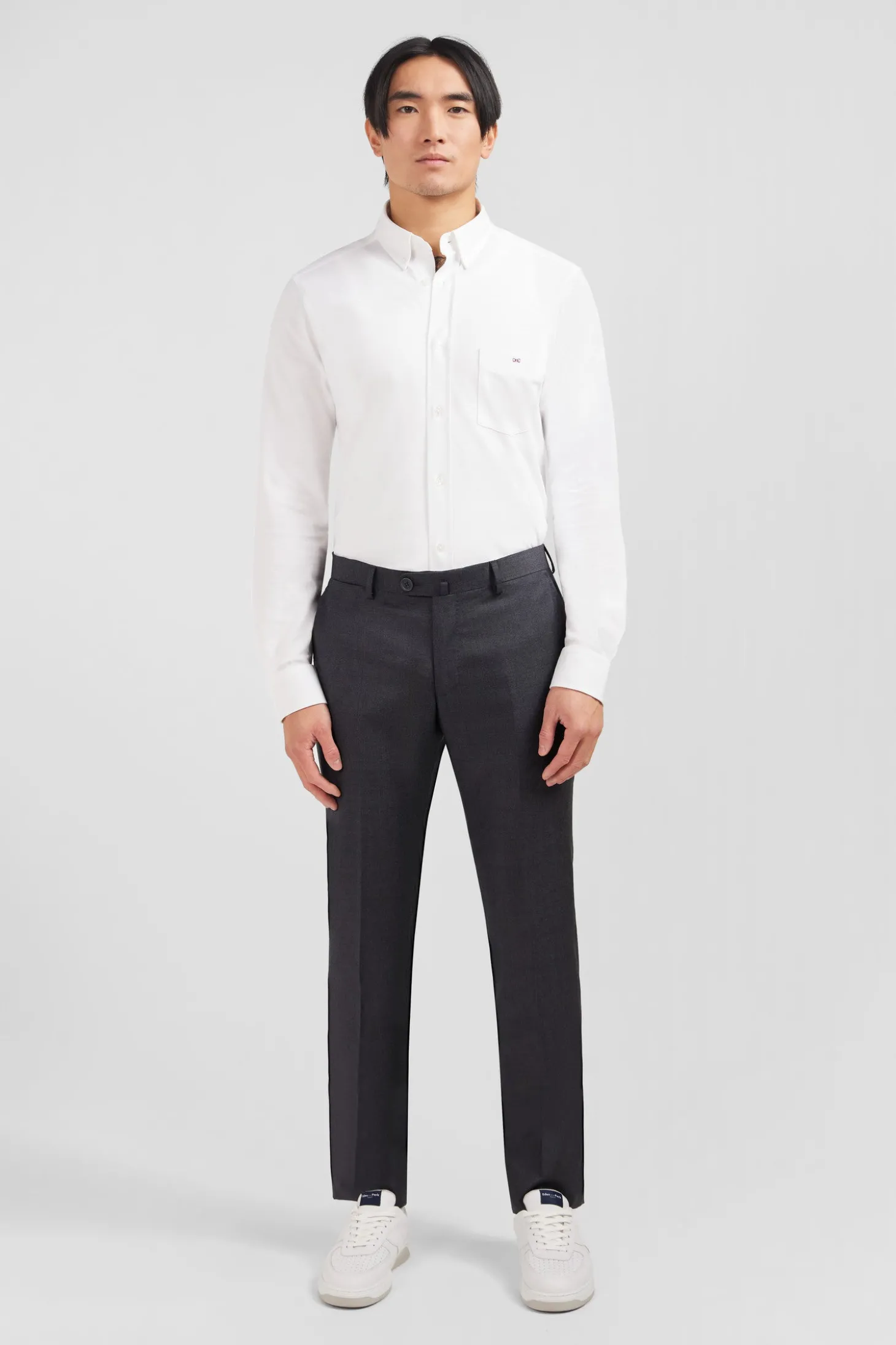 Slim grey wool trousers with broken fold