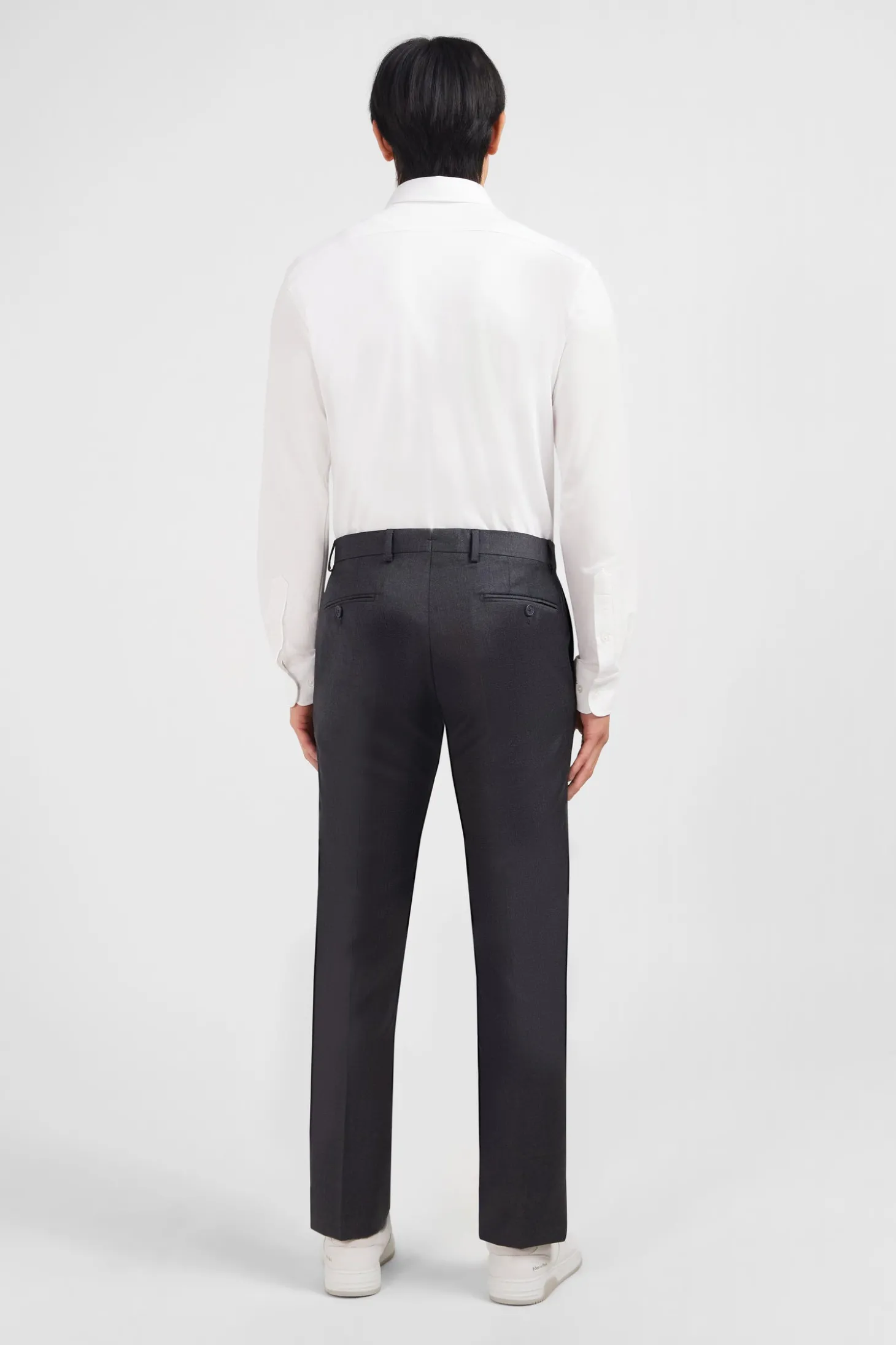 Slim grey wool trousers with broken fold