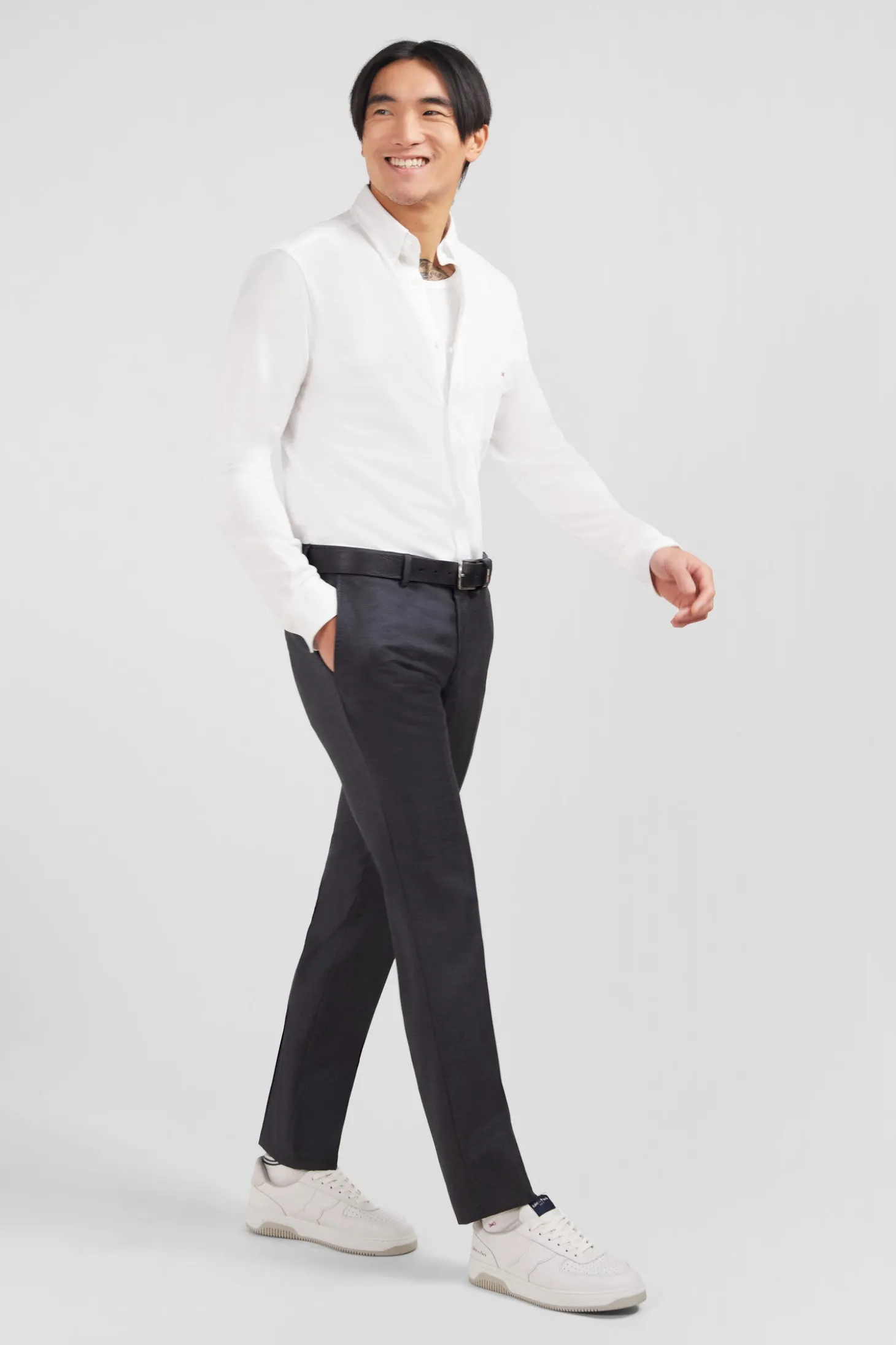 Slim grey wool trousers with broken fold