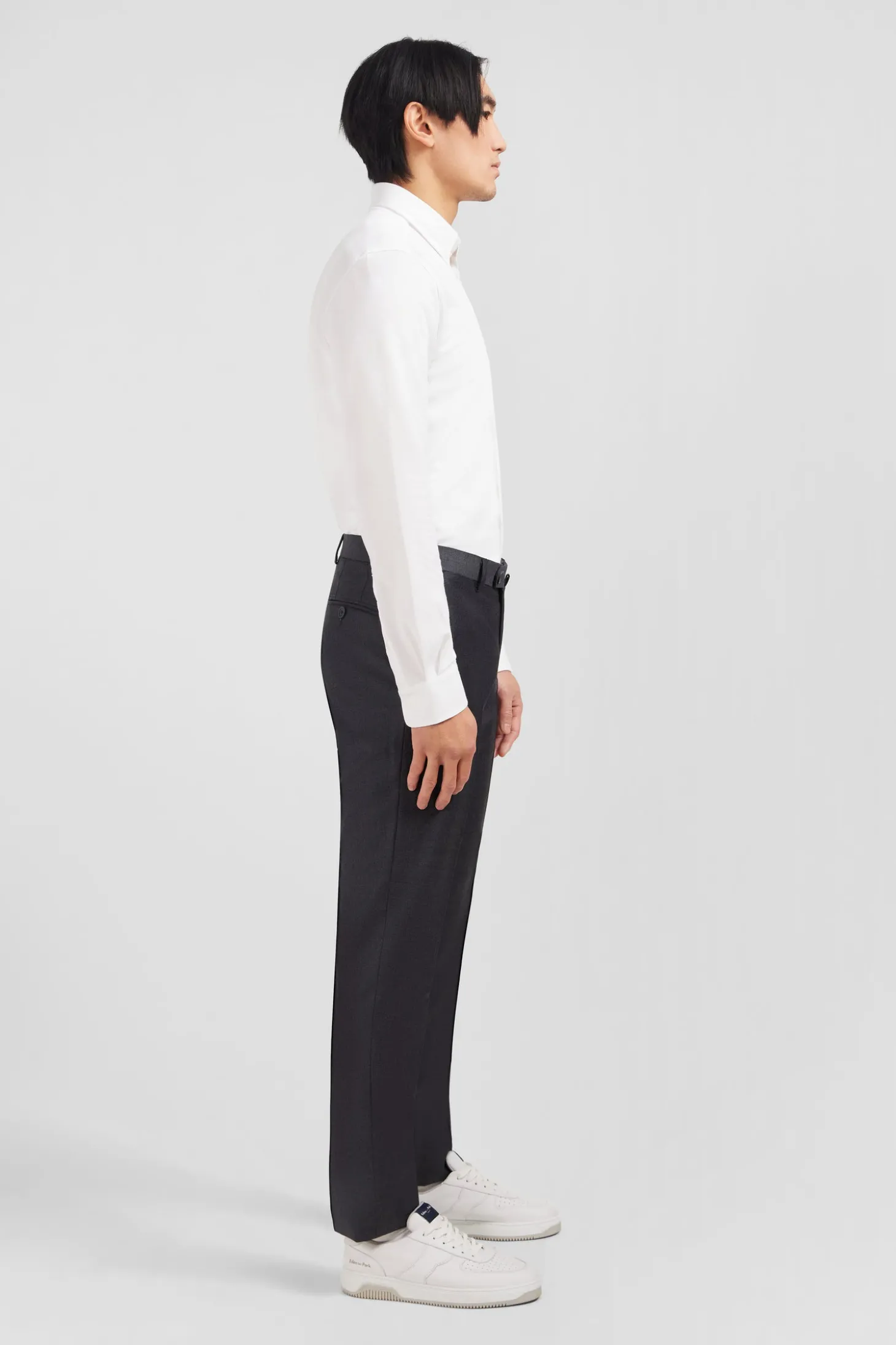 Slim grey wool trousers with broken fold