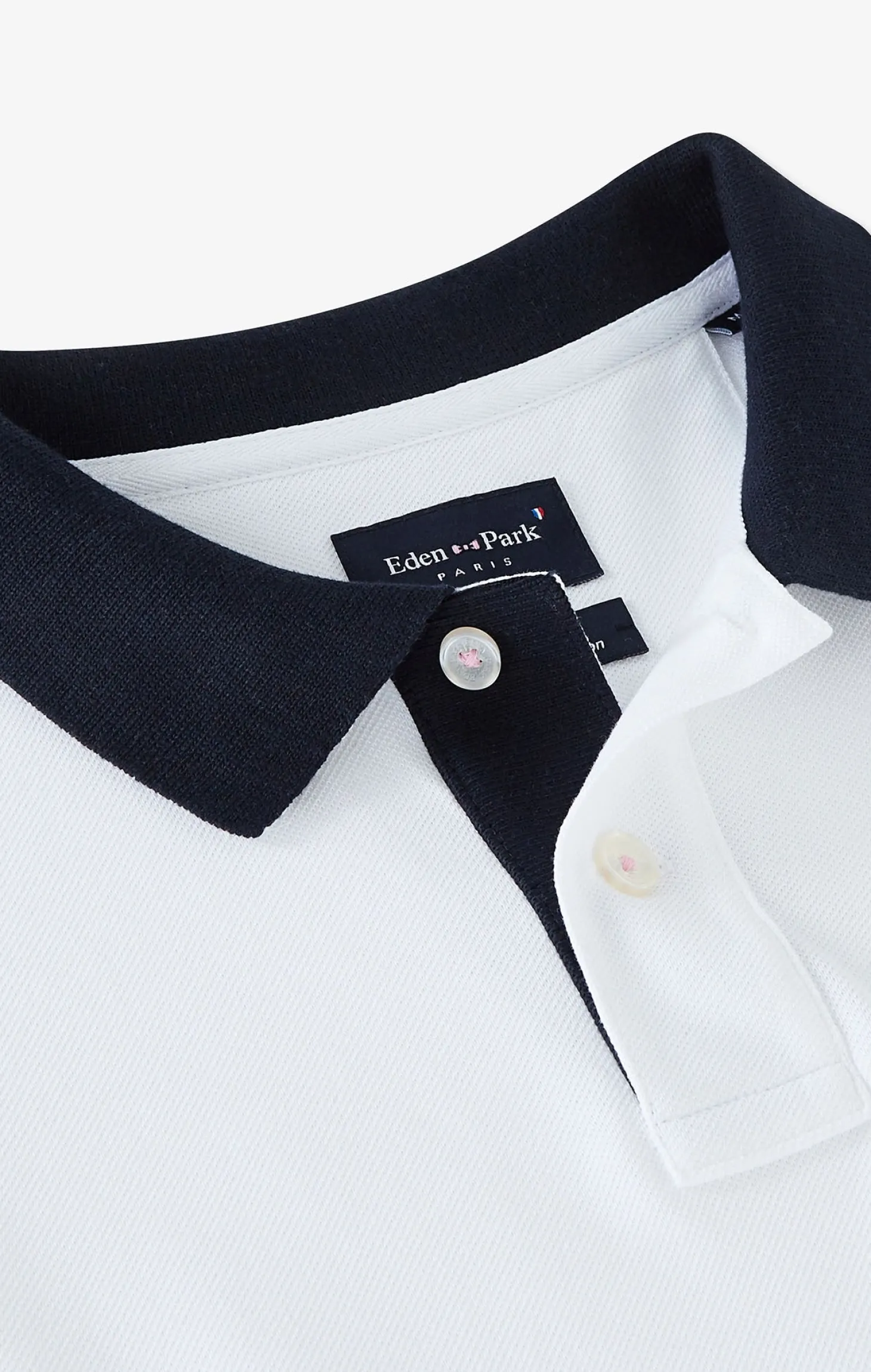 White pima cotton polo with contrasting accents