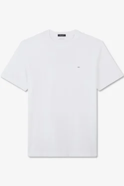 White T-shirt with embroidered bow tie on the back